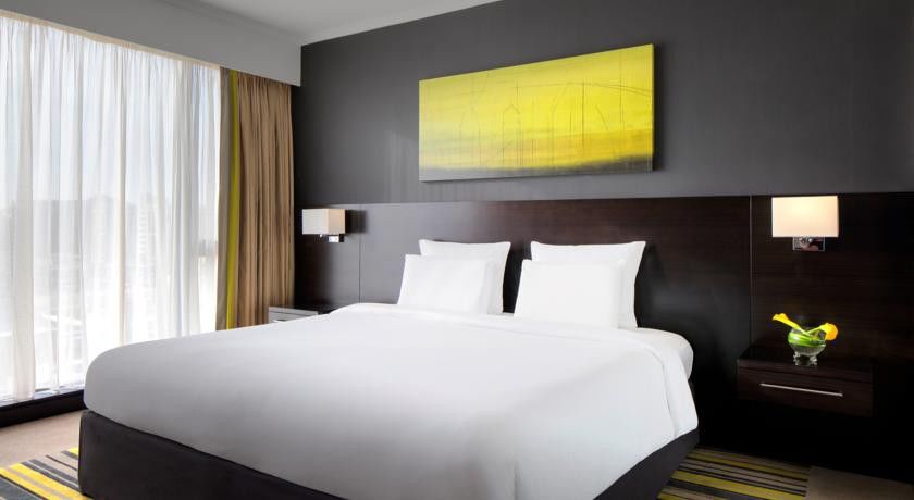 Pullman Dubai Creek City Centre Residences Exteriér fotografie A typical bedroom at the hotel